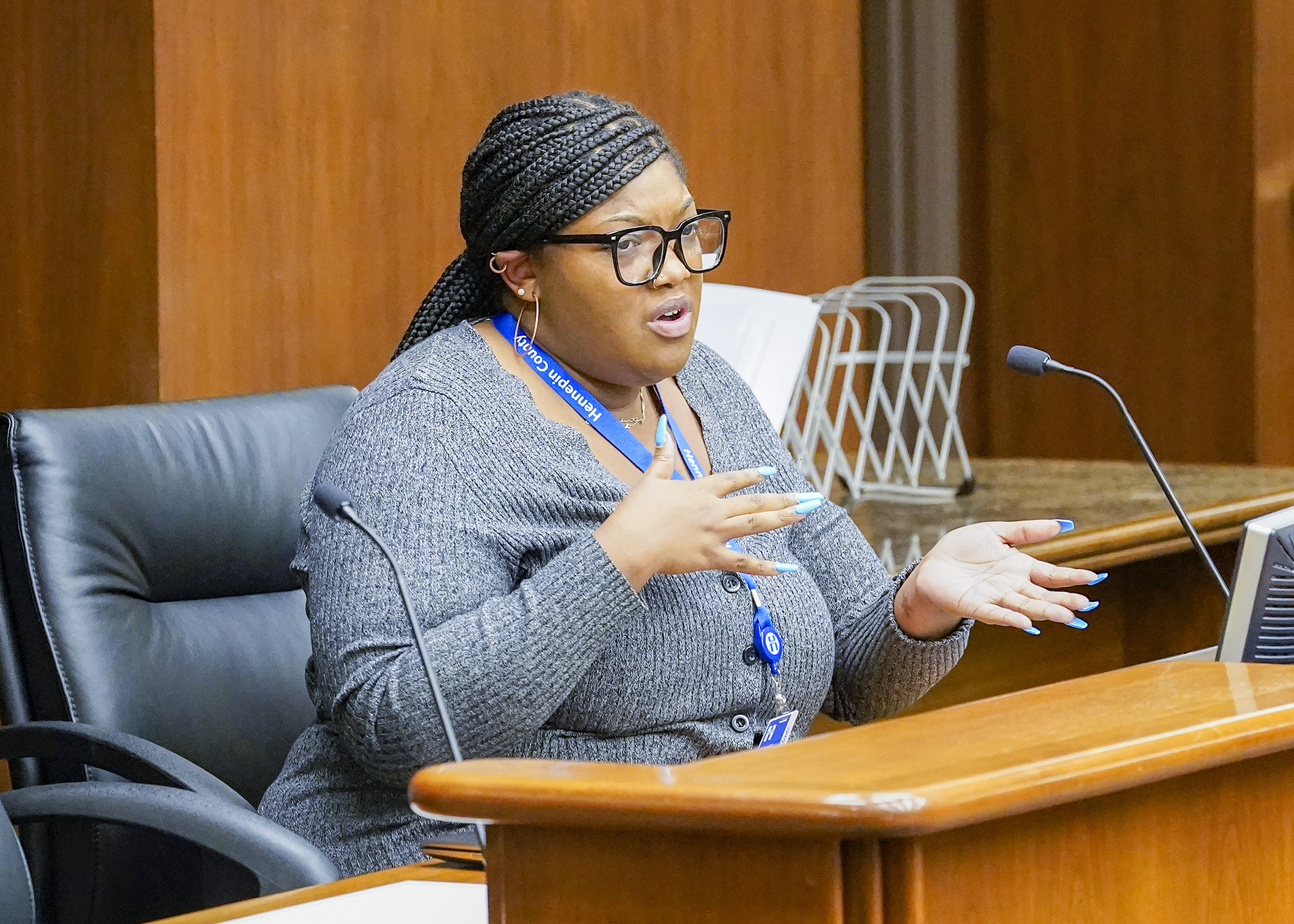 Brittani Walker, case management assistant with Hennepin County Housing Stabilization Services, testifies before the House Housing Finance and Policy Committee Jan. 17 during a presentation on the eviction crisis in Minnesota. (Photo by Andrew VonBank)
